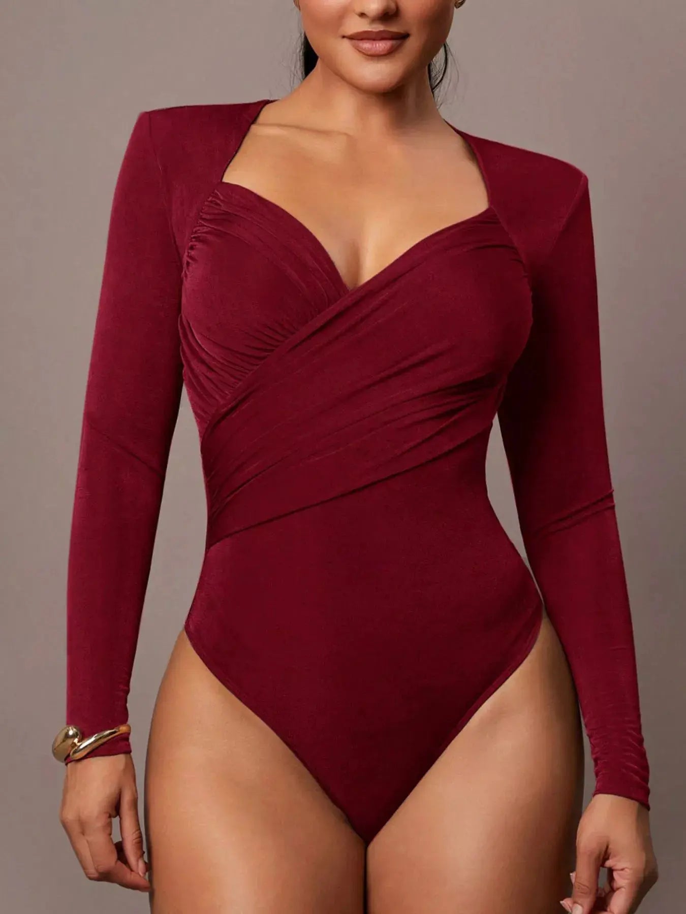 Ruched Surplice Long Sleeve Bodysuit by Trendsi