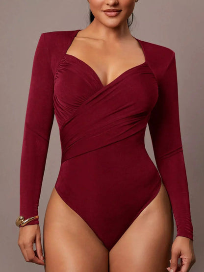 Ruched Surplice Long Sleeve Bodysuit by Trendsi
