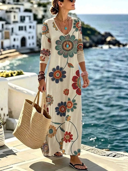 Floral Print V-Neck Long Sleeve Maxi Dress by Trendsi
