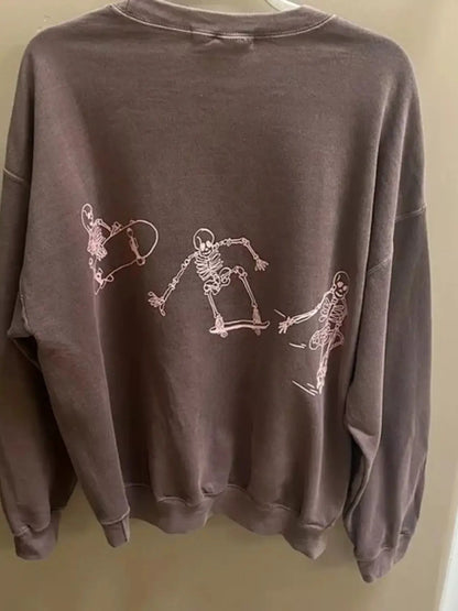 Skeleton Graphic Round Neck Sweatshirt by Trendsi