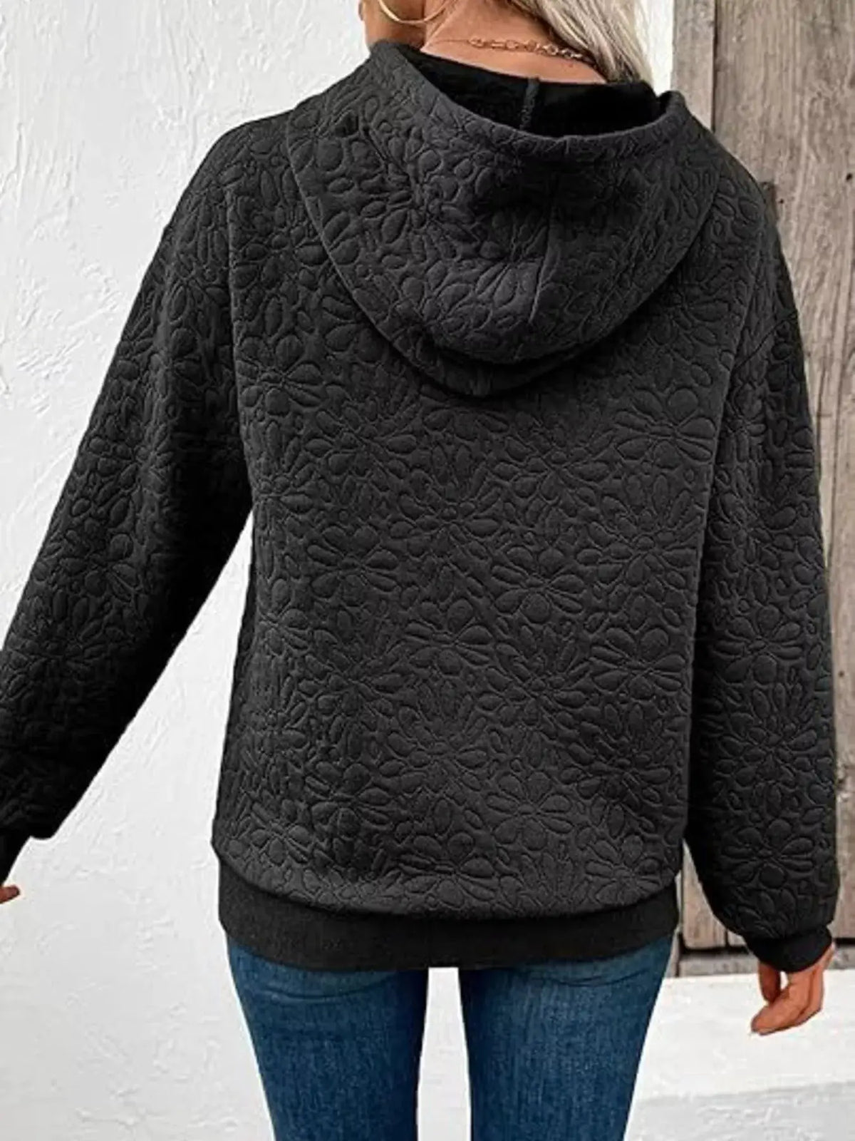 Textured Floral Embossed Drawstring Hoodie by Trendsi