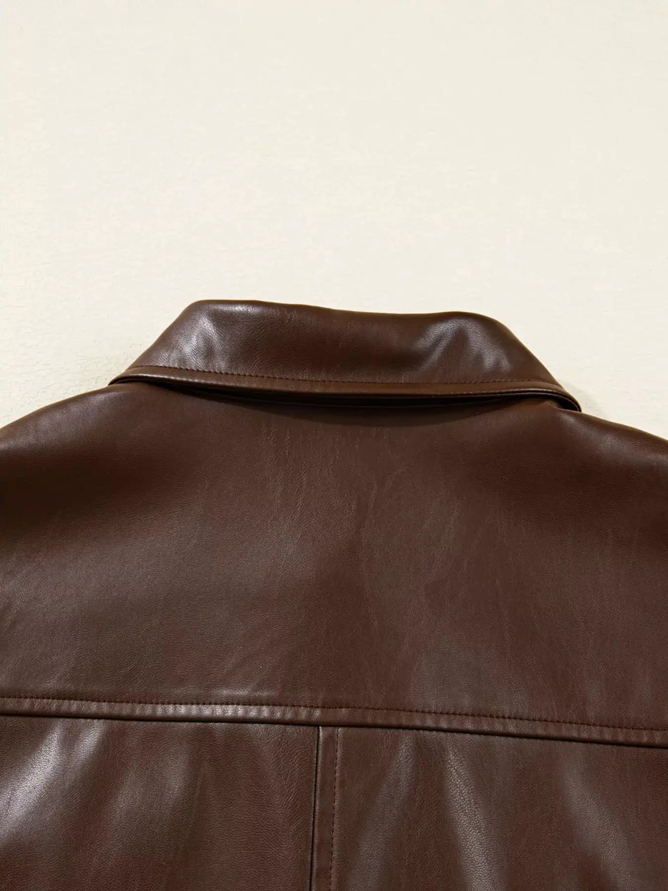 Double Flap Pocket Drawstring Hem Leather Jacket by Trendsi