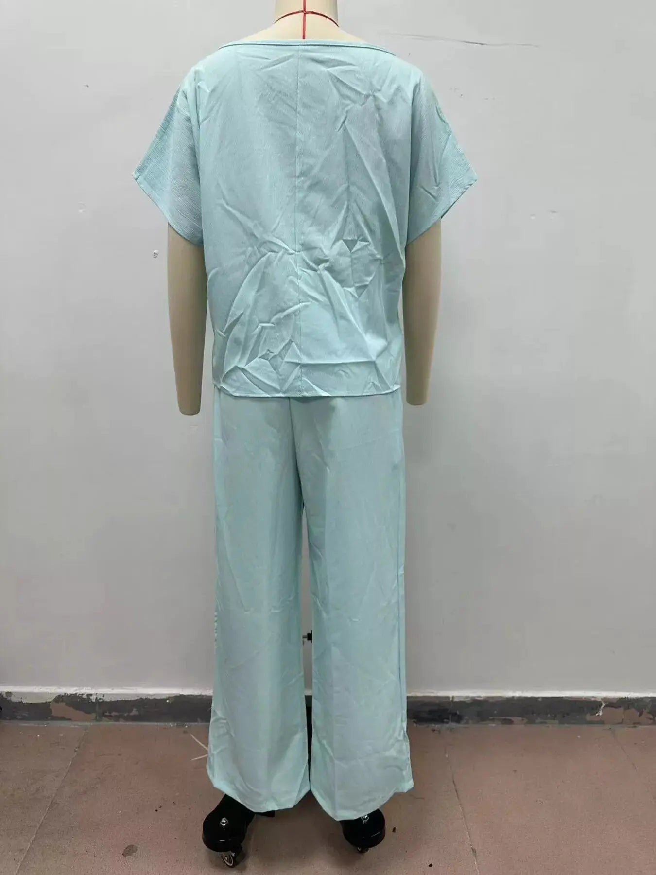 Full Size Solid Color Top and Wide-Leg Pants Set Plus Size by Trendsi