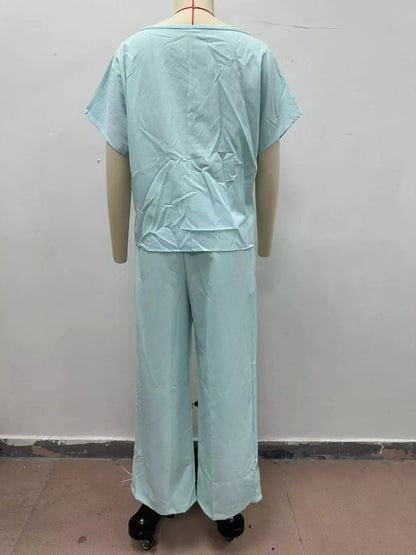 Full Size Solid Color Top and Wide-Leg Pants Set Plus Size by Trendsi