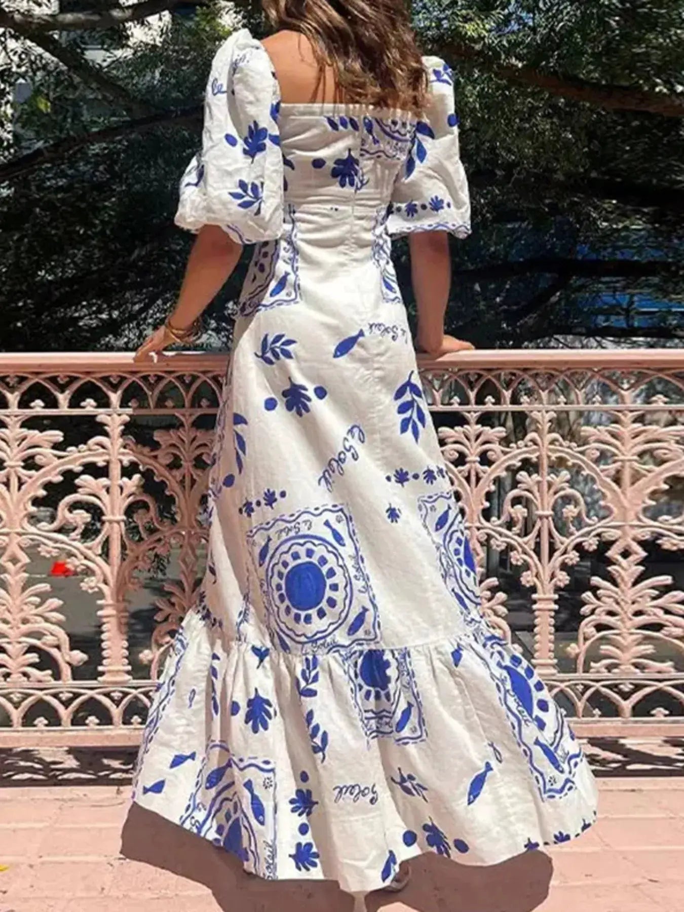 Full Size Floral Print Puff Sleeve Maxi Dress Plus Size by Trendsi