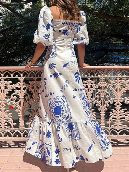 Full Size Floral Print Puff Sleeve Maxi Dress Plus Size by Trendsi