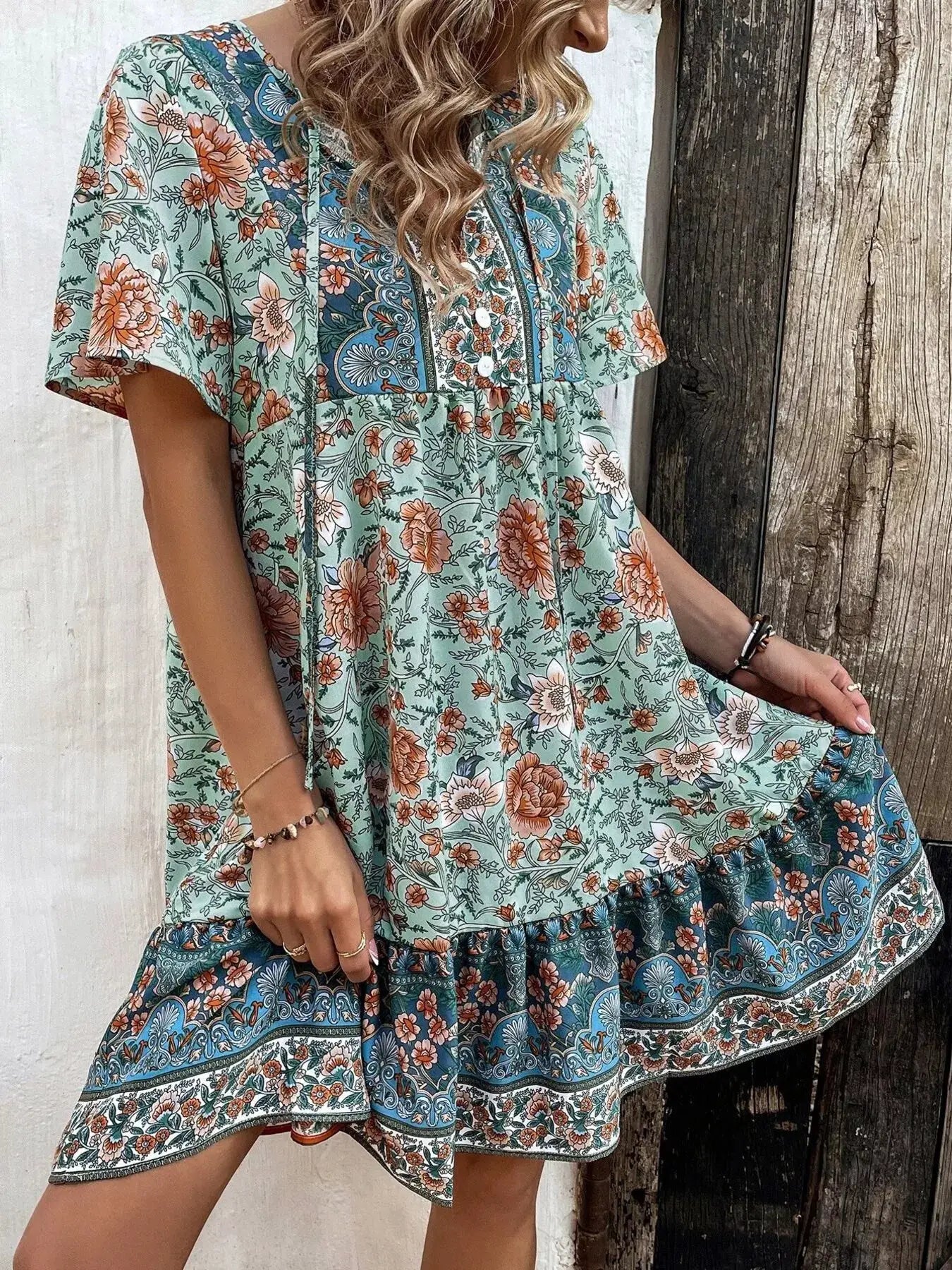 Floral Print Tie-Neck Ruffle Hem Mini Dress by Trendsi