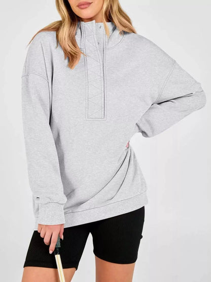 Half Snap Dropped Shoulder Hoodie by Trendsi