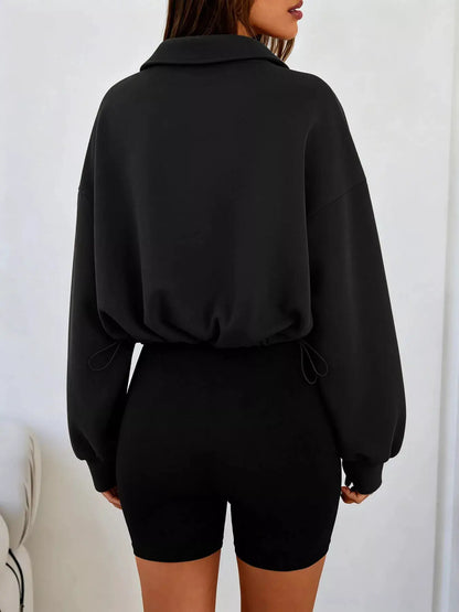 Half Zip Drawstring Hem Sweatshirt by Trendsi