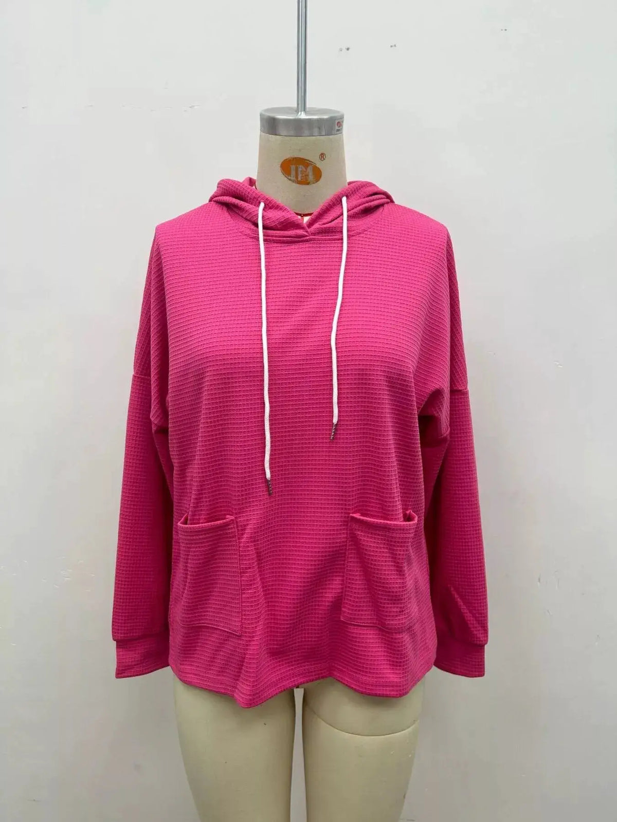 Full Size Waffle Knit Drawstring Long Sleeve Hoodie Plus Size by Trendsi