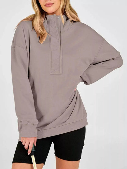 Half Snap Dropped Shoulder Hoodie by Trendsi