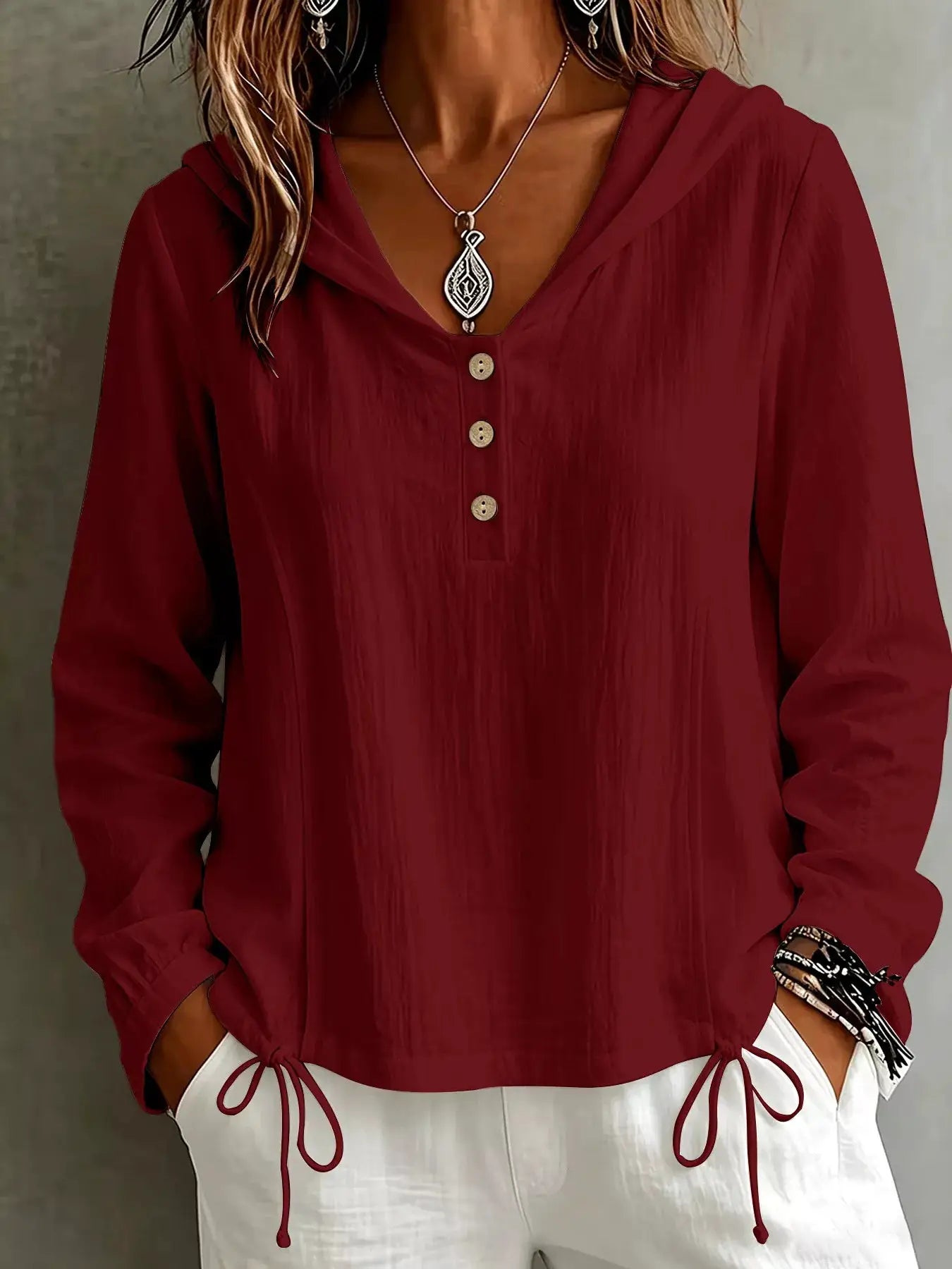 Button Detail Long Sleeve Hooded Blouse by Trendsi