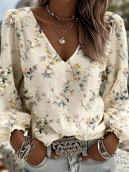 Floral Print V-Neck Long Sleeve Blouse by Trendsi