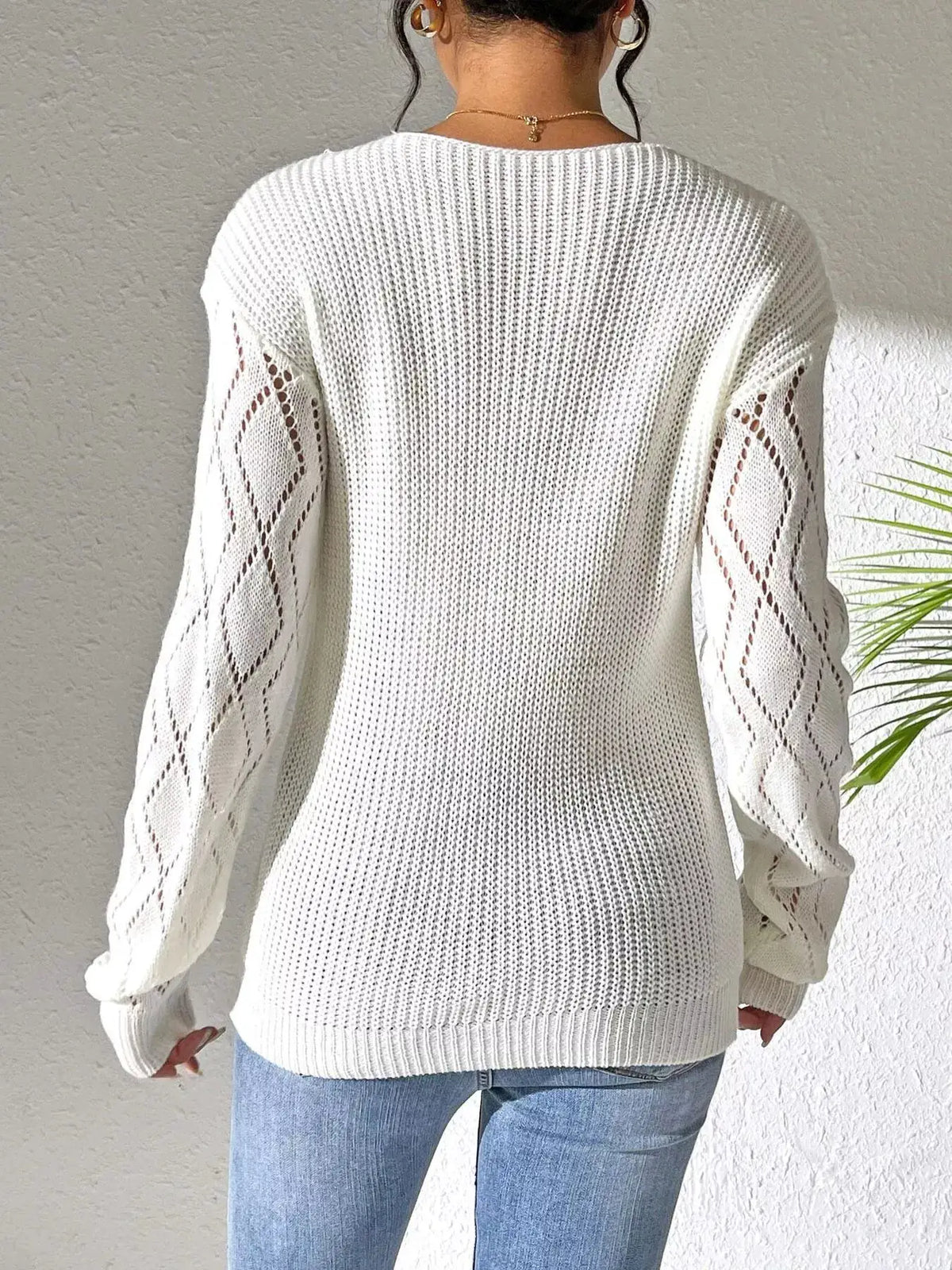 Floral Applique V-Neck Openwork Sweater by Trendsi