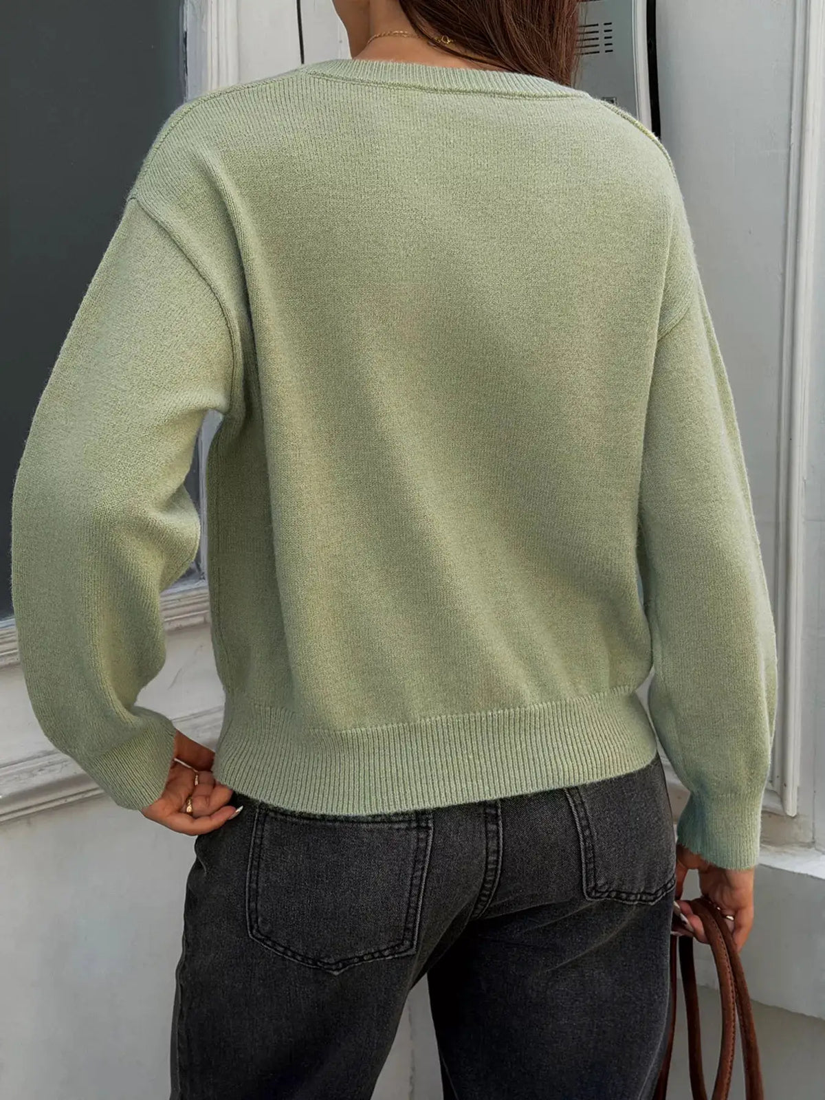 V-Neck Ribbed Hem Sweater by Trendsi