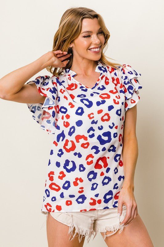 BiBi Leopard Notched Ruffled Cap Sleeve Blouse - Bitsy Gypsy Boutique