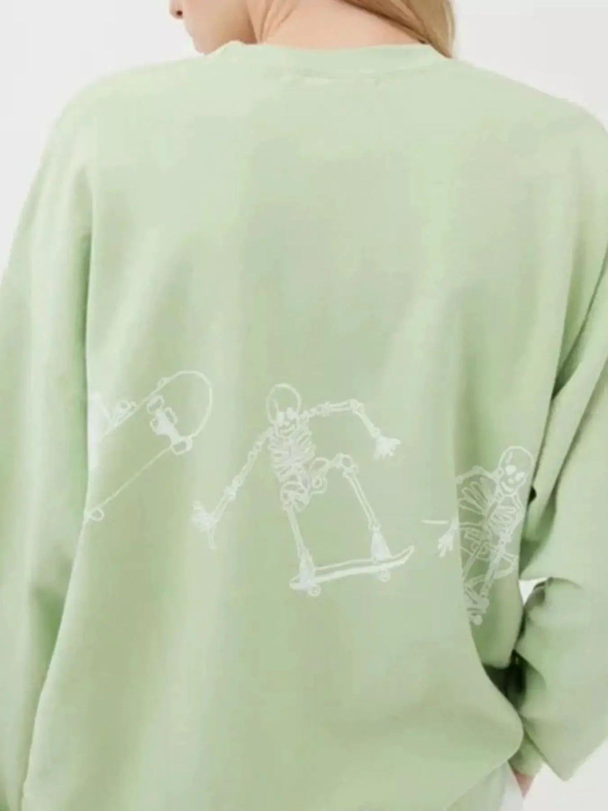 Skeleton Graphic Round Neck Sweatshirt by Trendsi