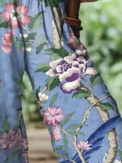 Full Size Floral Wide-Leg Pants Plus Size by Trendsi