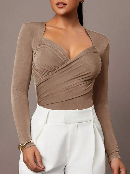 Ruched Surplice Long Sleeve Bodysuit by Trendsi