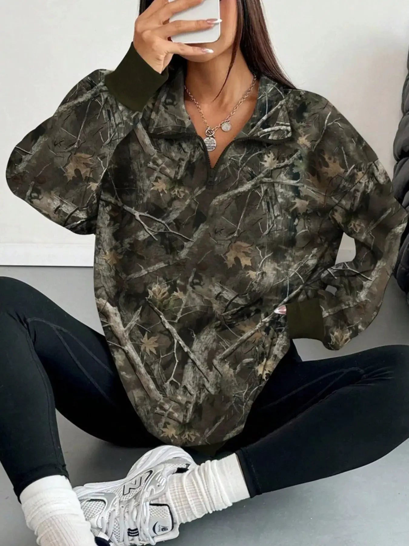 Quarter-Zip Printed Sweatshirt with Ribbed Cuffs by Trendsi
