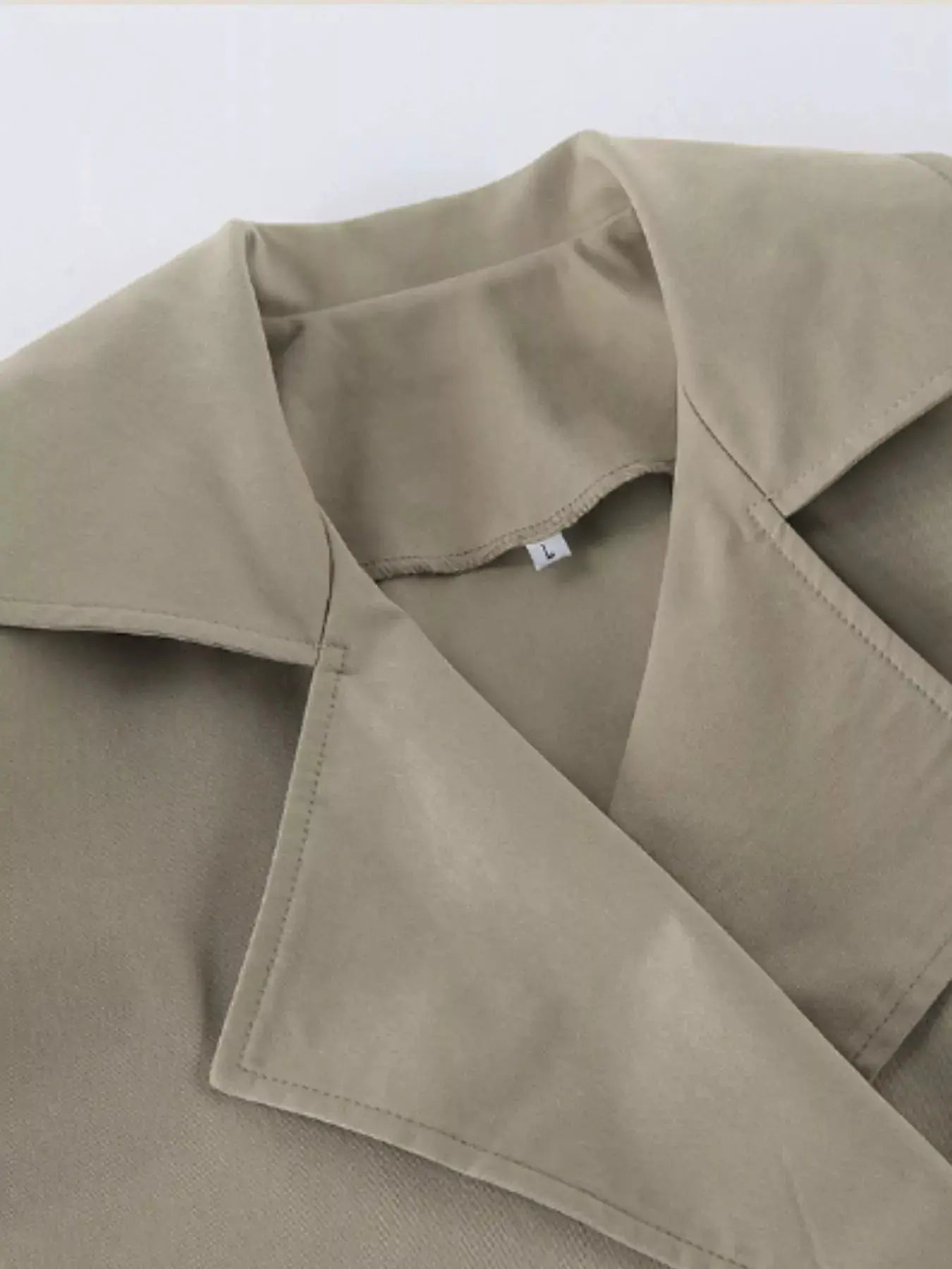 Chic Double-Breasted Belted Trench Coat by Trendsi