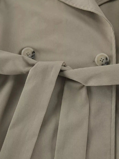 Chic Double-Breasted Belted Trench Coat by Trendsi