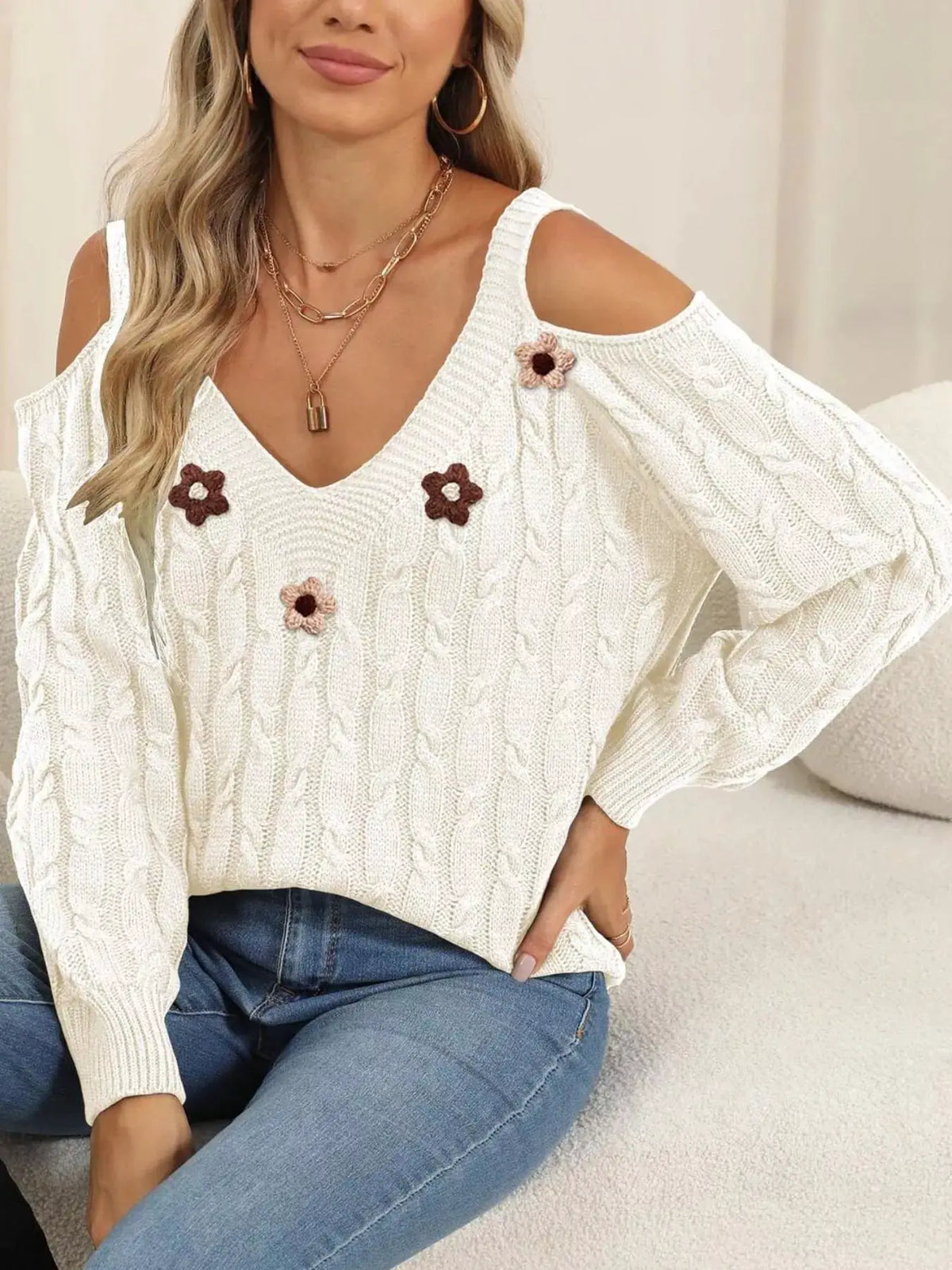 Floral Applique Cold Shoulder Cable Knit Sweater by Trendsi