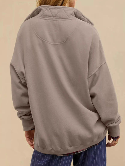Half Snap Dropped Shoulder Sweatshirt by Trendsi