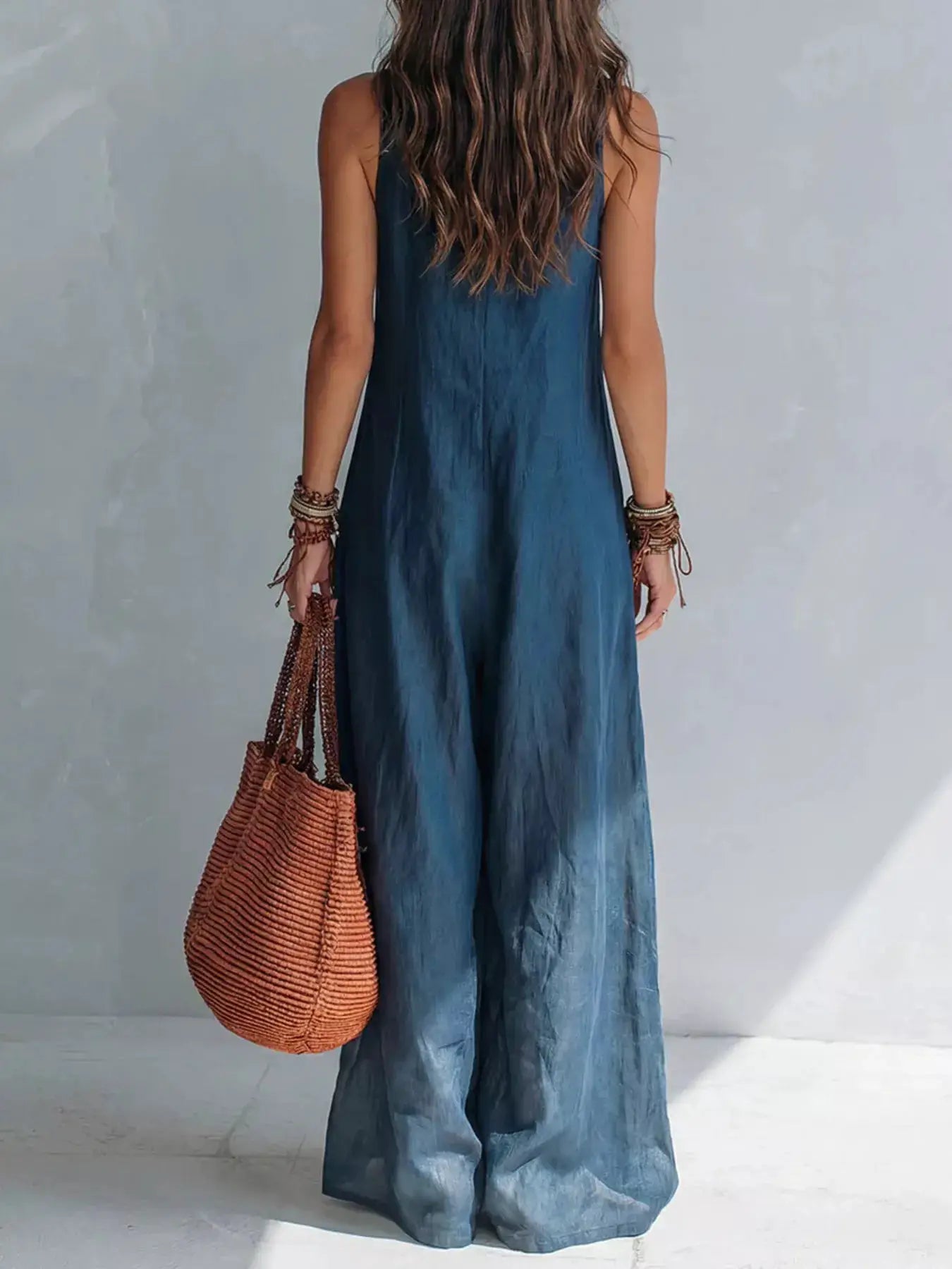 Full Size V-Neck Sleeveless Wide-Leg Jumpsuit Plus Size by Trendsi