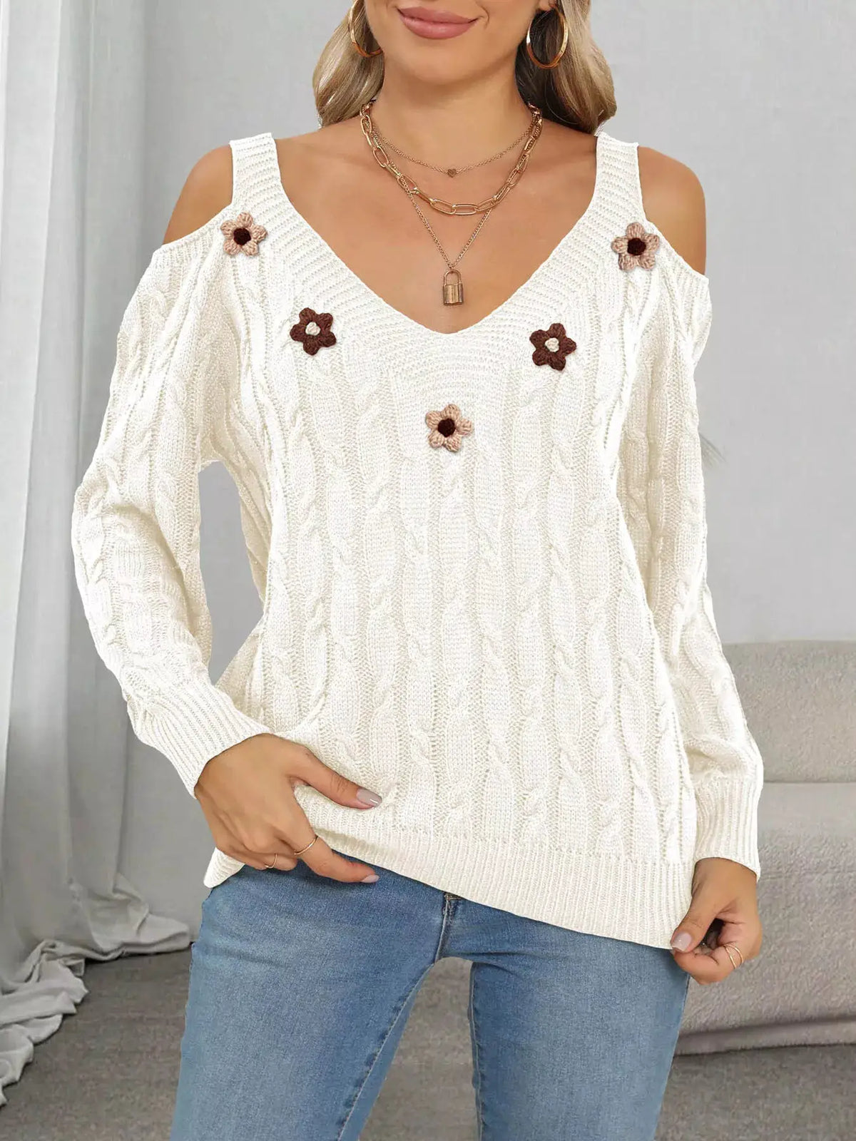 Floral Applique Cold Shoulder Cable Knit Sweater by Trendsi