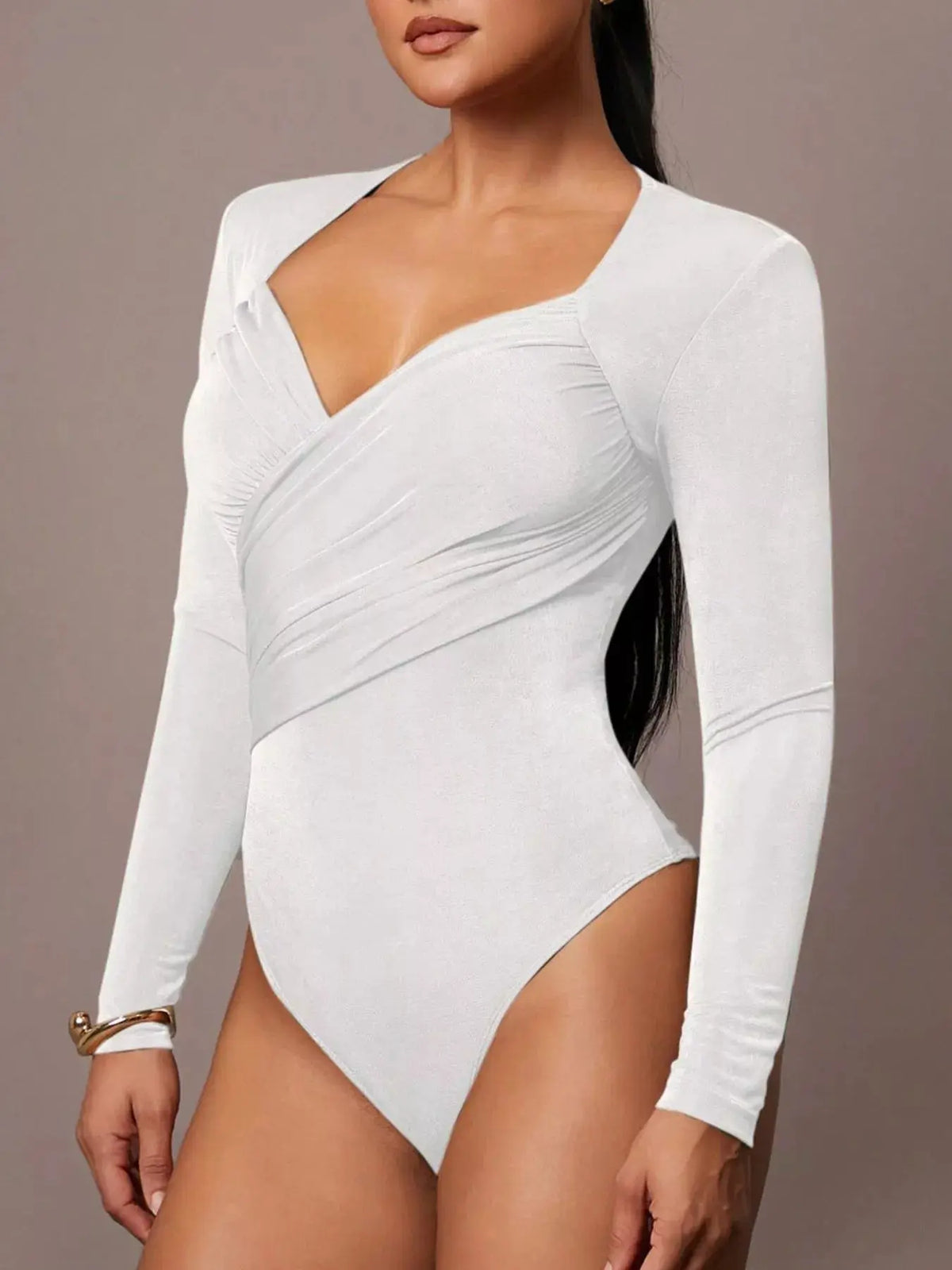 Ruched Surplice Long Sleeve Bodysuit by Trendsi