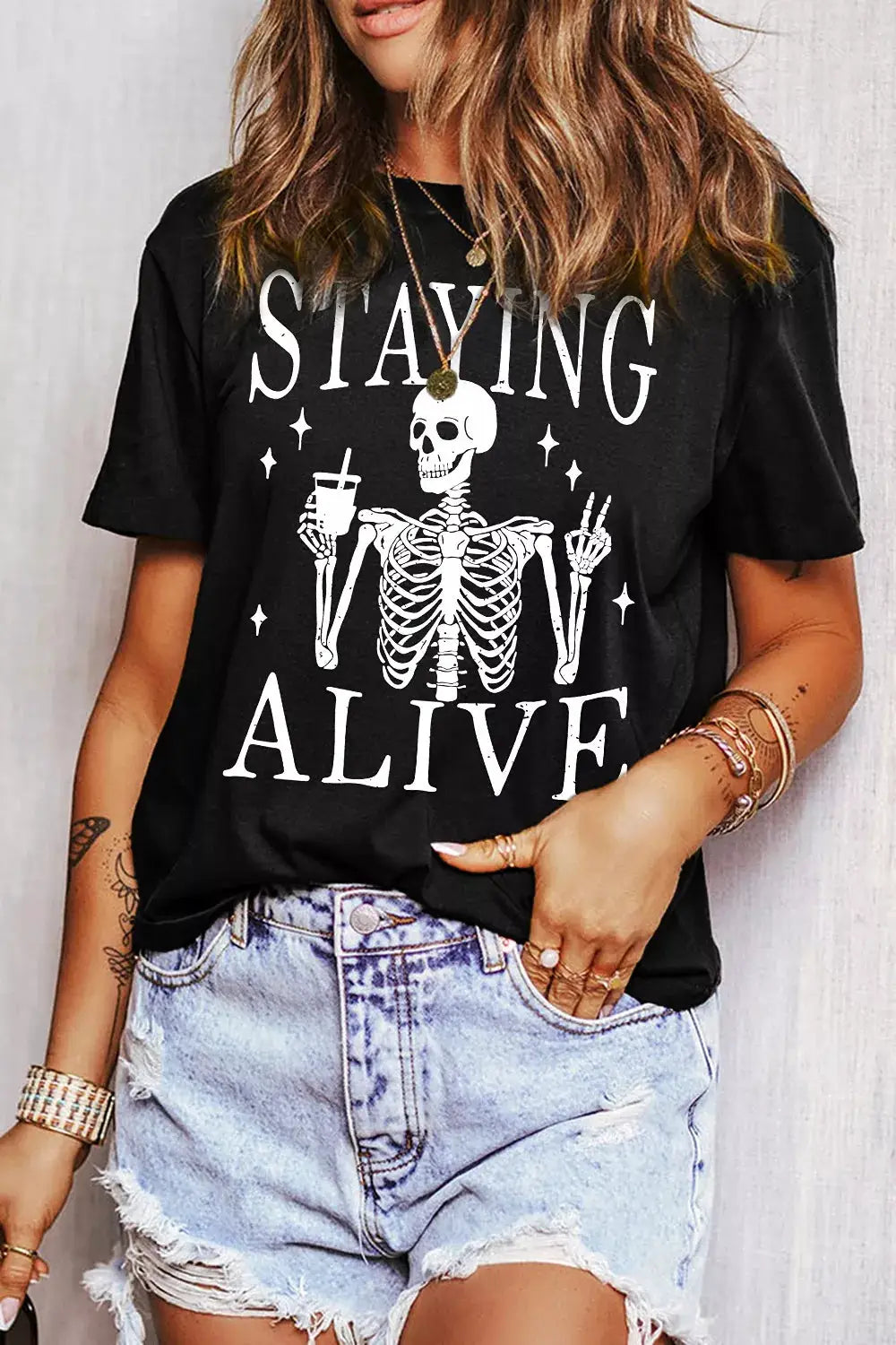 STAYING ALIVE Funny Skeleton Graphic Round Neck T Shirt by Trendsi