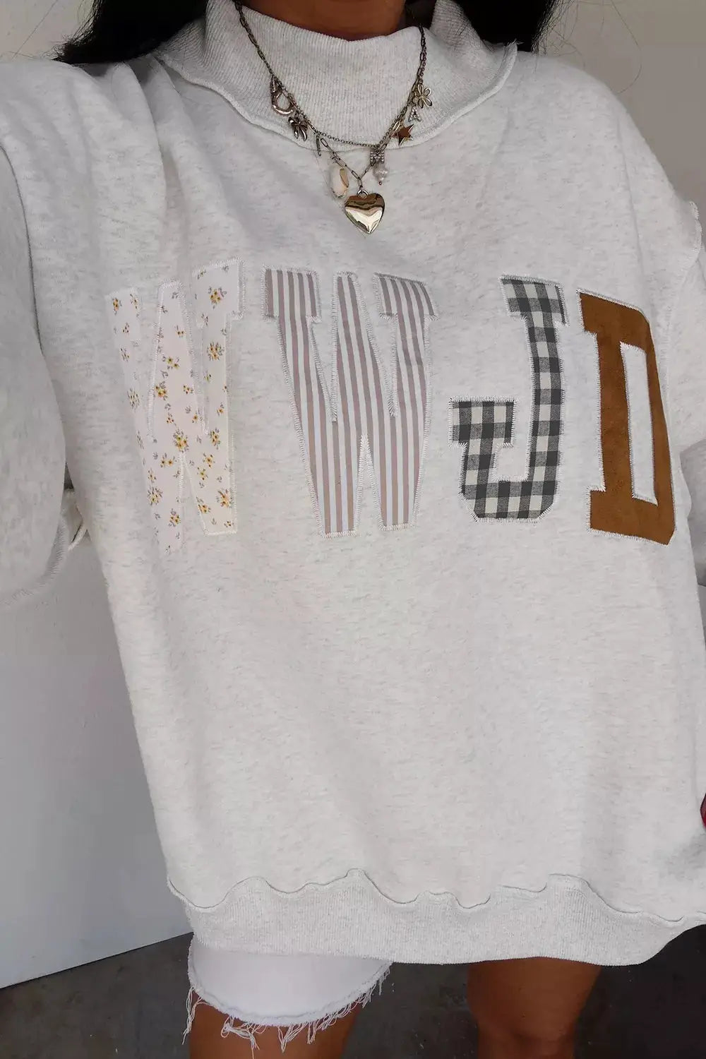 WWJD Mix Pattern Letter Graphic Exposed Seam Loose Sweatshirt by Trendsi