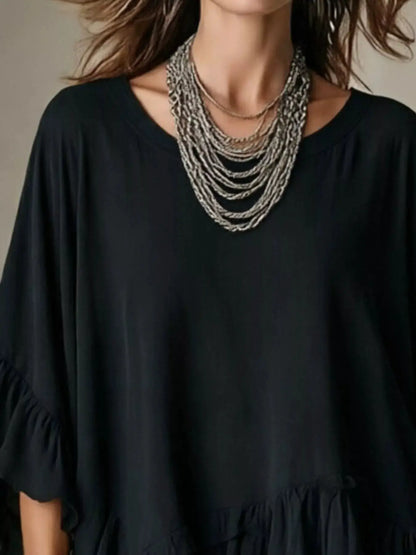 Ruffled Hem Loose Fit Top by Trendsi