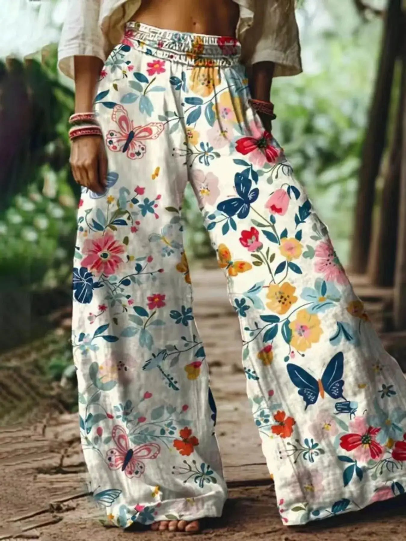 Full Size Floral Wide-Leg Pants Plus Size by Trendsi