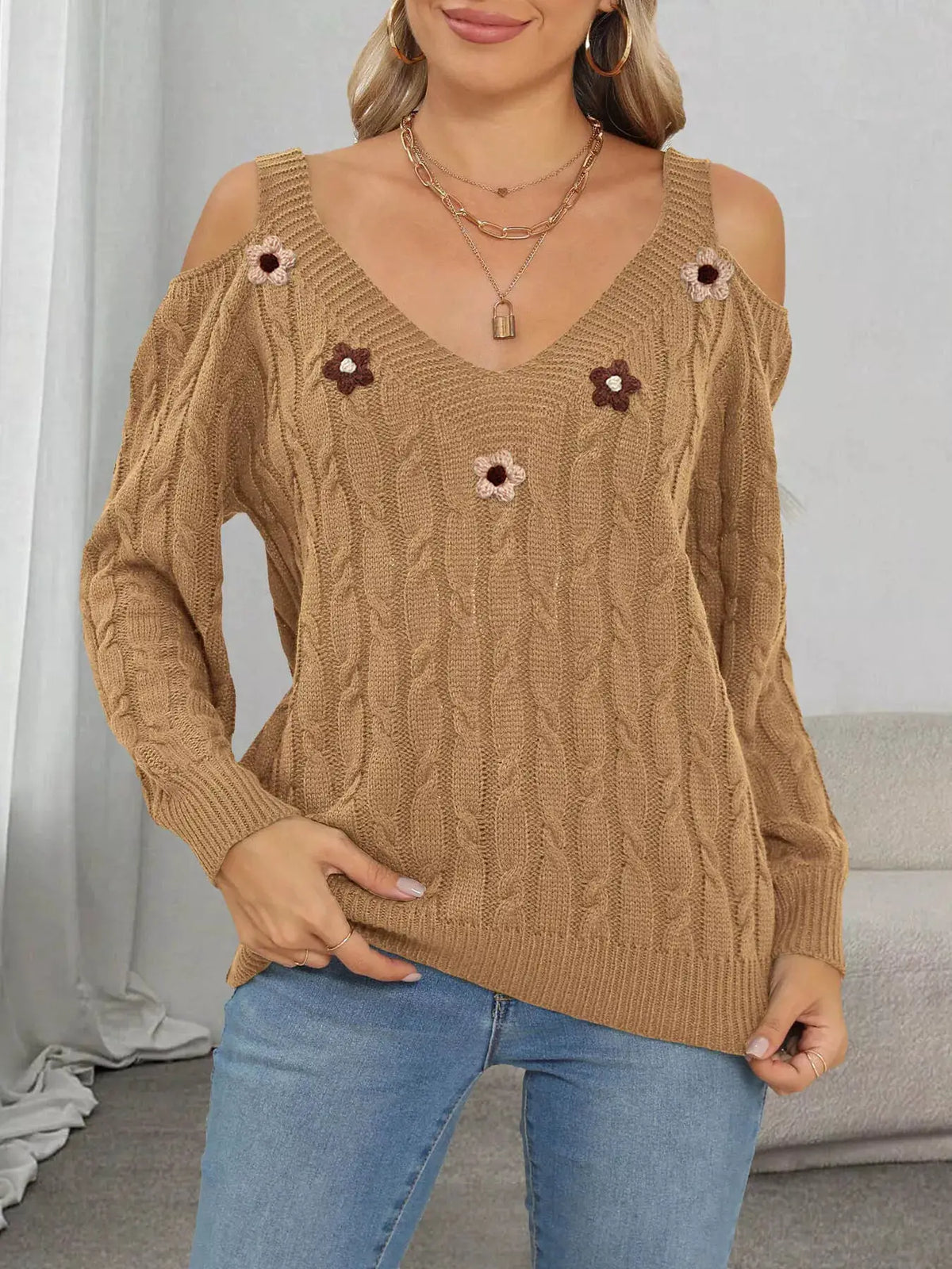 Floral Applique Cold Shoulder Cable Knit Sweater by Trendsi