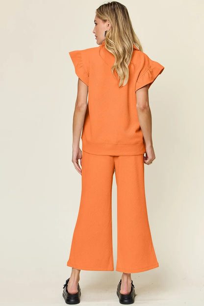 Double Take Texture Ruffle Short Sleeve Top and Drawstring Wide Leg Pants Set - Bitsy Gypsy Boutique
