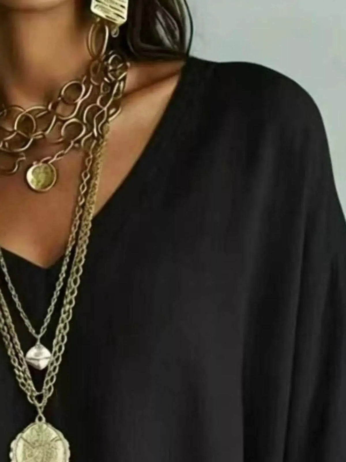 Full Size V-Neck Loose Fit T-Shirt Plus Size by Trendsi