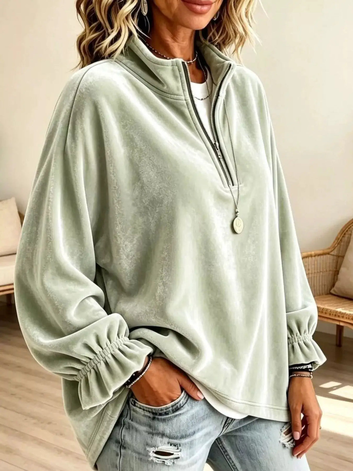 Velvet Quarter-Zip Sweatshirt with Ruffled Cuffs by Trendsi