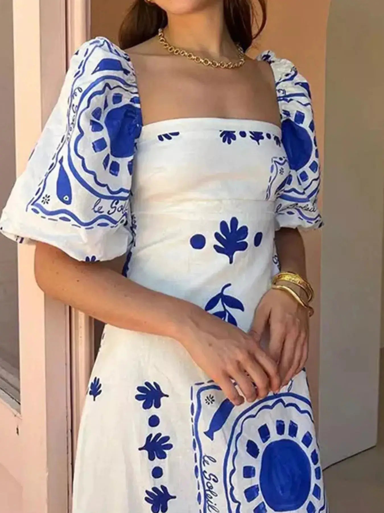 Full Size Floral Print Puff Sleeve Maxi Dress Plus Size by Trendsi