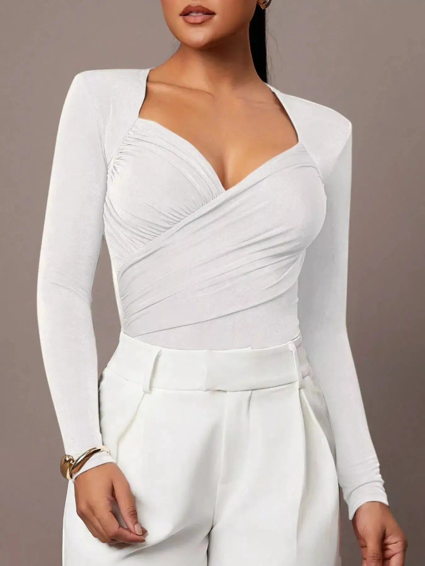 Ruched Surplice Long Sleeve Bodysuit by Trendsi