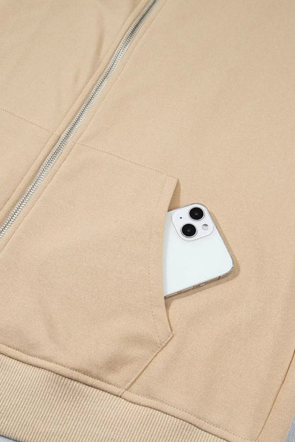 Polka Dot Zip-Up Hoodie by Trendsi