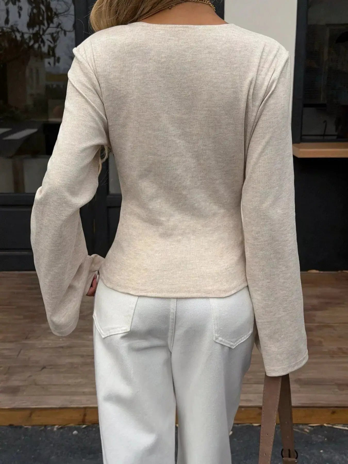 Elegant V-Neck Wrap Asymmetrical Blouse with Flared Sleeves by Trendsi