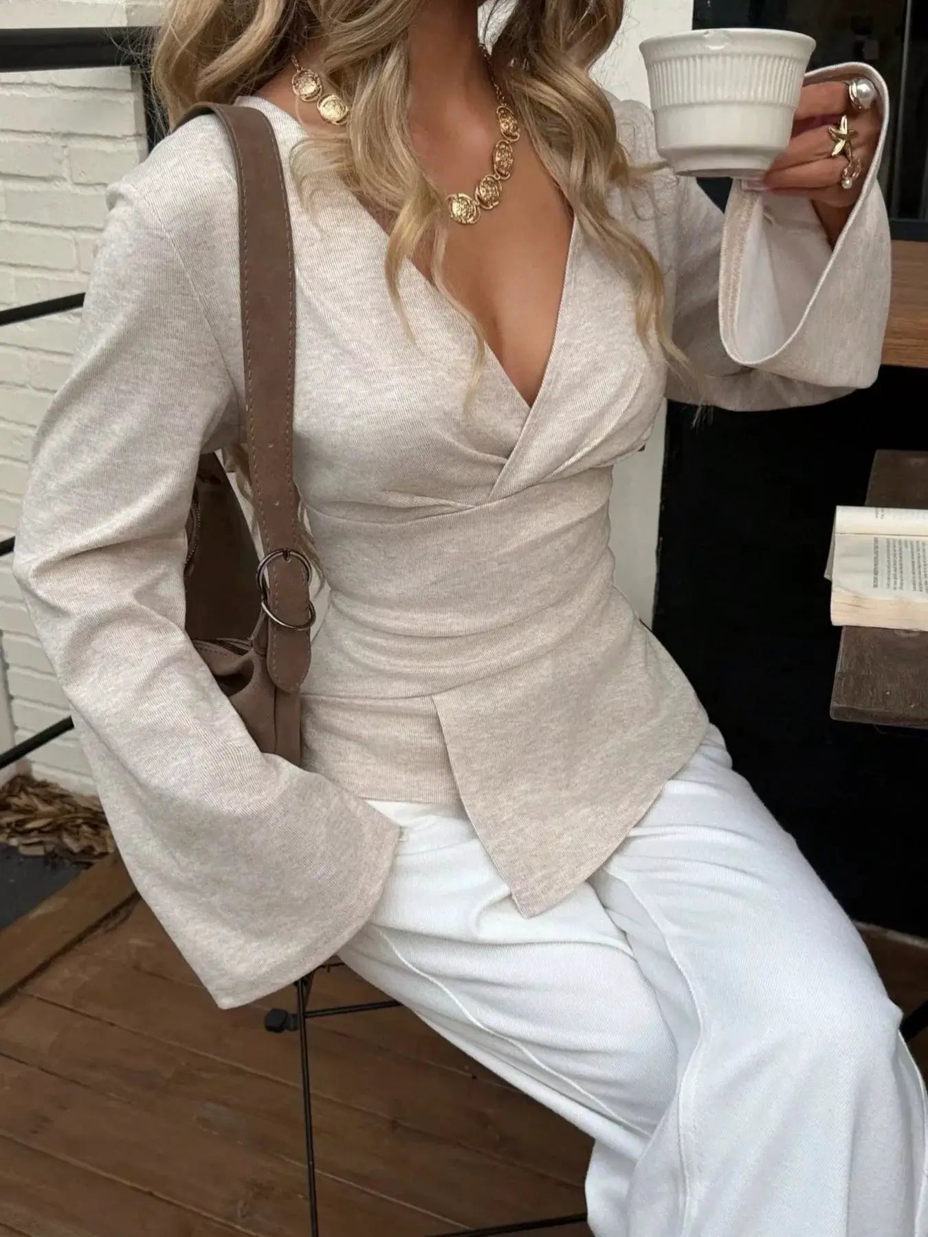 Elegant V-Neck Wrap Asymmetrical Blouse with Flared Sleeves by Trendsi