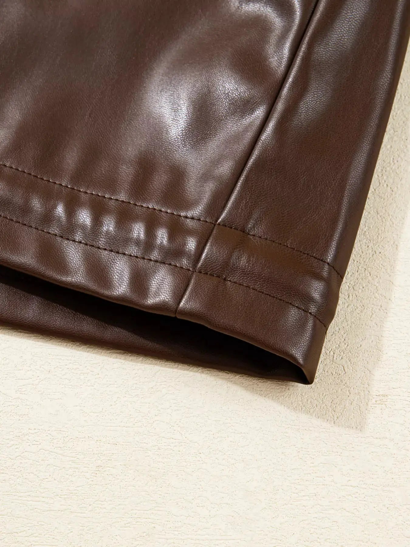 Double Flap Pocket Drawstring Hem Leather Jacket by Trendsi