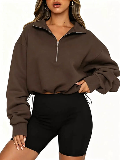 Half Zip Drawstring Hem Sweatshirt by Trendsi