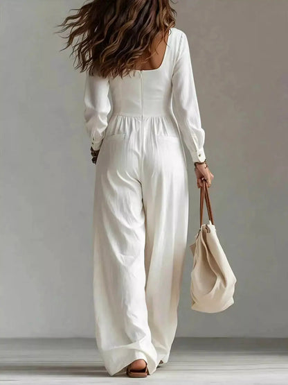 V-Neck Long Sleeve Button-Down Wide Leg Jumpsuit by Trendsi