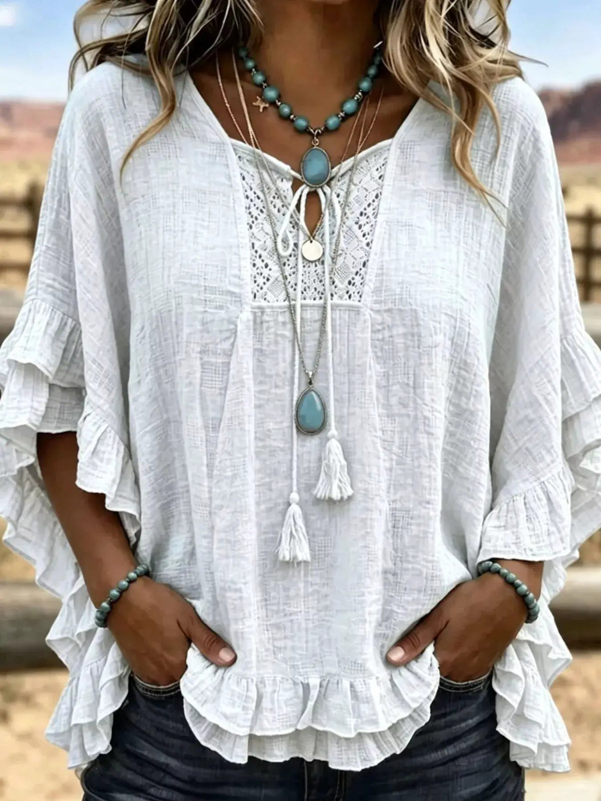 Full Size Tassel Tie Neck Ruffled Hem Blouse Plus Size - Bitsy Gypsy Boutique
