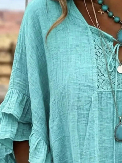 Full Size Tassel Tie Neck Ruffled Hem Blouse Plus Size - Bitsy Gypsy Boutique