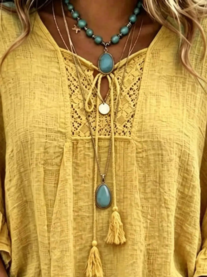 Full Size Tassel Tie Neck Ruffled Hem Blouse Plus Size - Bitsy Gypsy Boutique